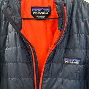 Patagonia navy Jacket with orange Lining and zippers